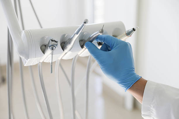Professional Root Canal Treatment technician working in Islandia, NY